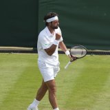 Nikoloz Basilashvili a créé la surprise en battant Lorenzo Musetti mardi KEYSTONE/AP/Joanna Chan